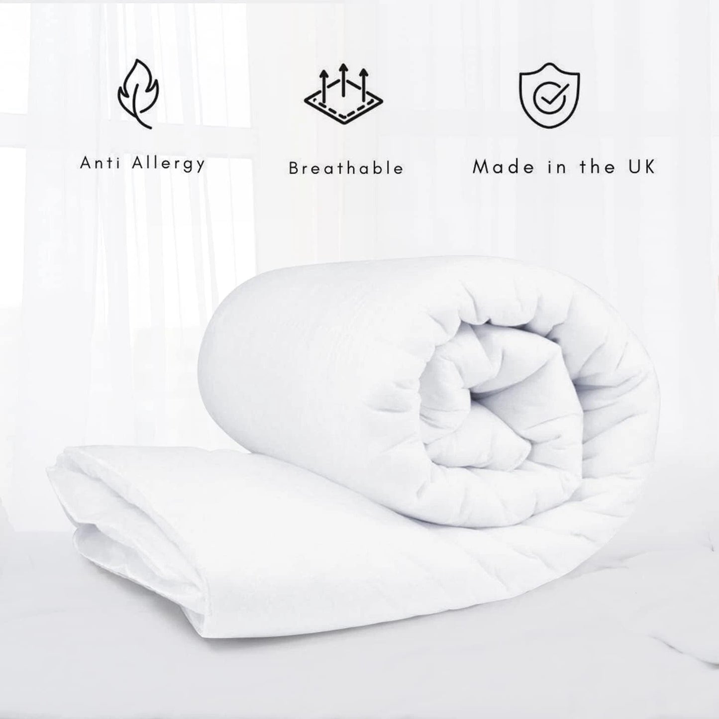 White quilt with anti-allergy, breathable, and made in the UK icons on a light gray background