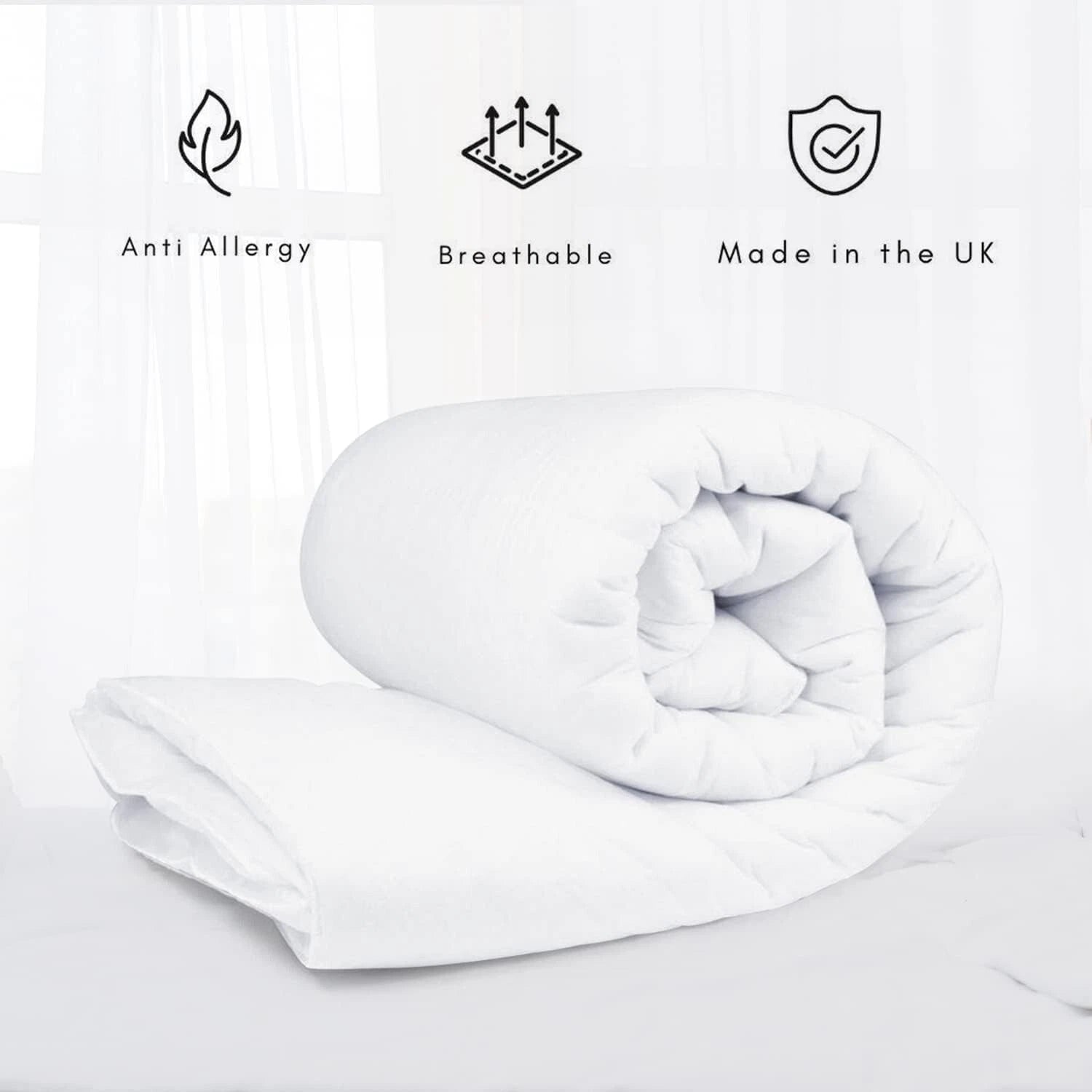 White quilt with anti-allergy, breathable, and made in the UK icons on a light gray background